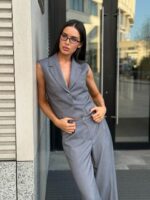 Костюм жилет с клапанами брюки палаццо