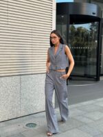 Костюм жилет с клапанами брюки палаццо