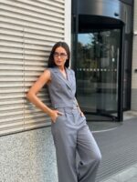 Костюм жилет с клапанами брюки палаццо