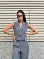 Костюм жилет с клапанами брюки палаццо