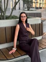 Костюм жилет с клапанами брюки палаццо